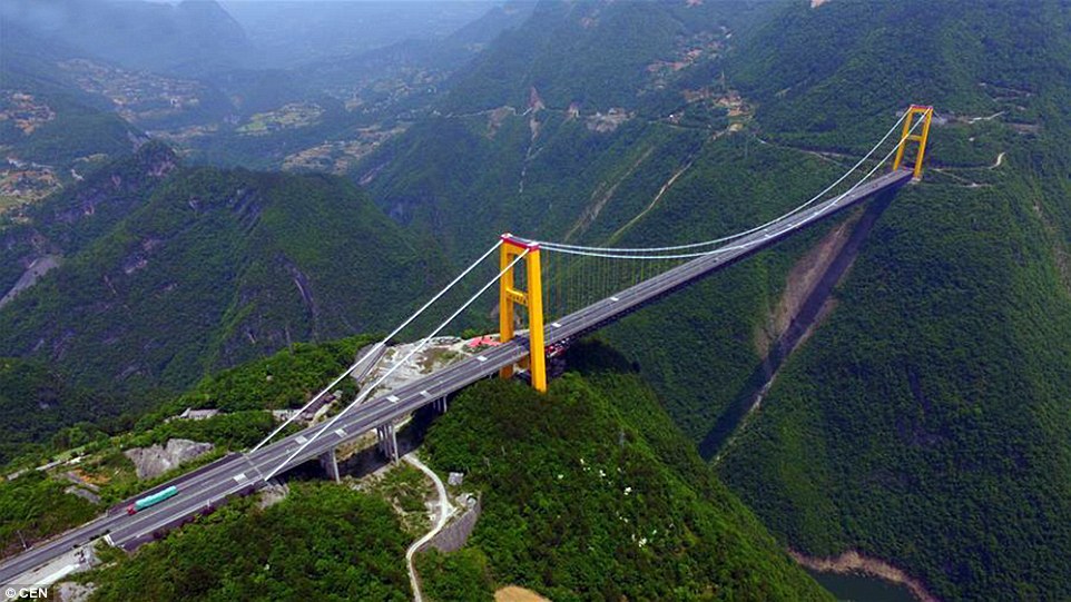 Now THAT'S a high-way! Spectacular aerial images show China's impressive mountain overpass built over a 1,630ft valley - Property News in Myanmar from iMyanmarHouse.com
